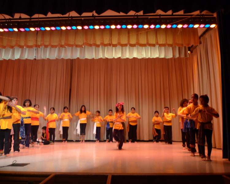 Students in Bharatanatyam dance performance