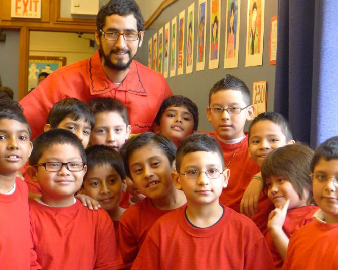 Hector with his students before their performance