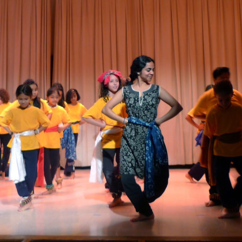 Malini leading students in Bharatanatyam dance class